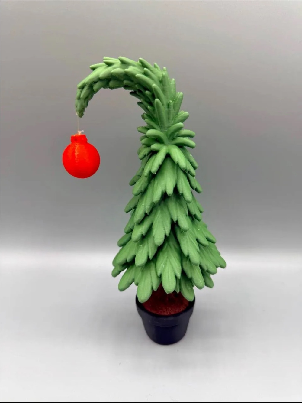 Whimsical Green Bend-Top Holiday Tree with Red Ornament